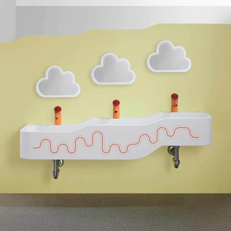 Geberit Bambini leke- og vaskeområde i karminrødt og oransje Geberit Bambini leke- og vaskeområde i karminrødt og oransje