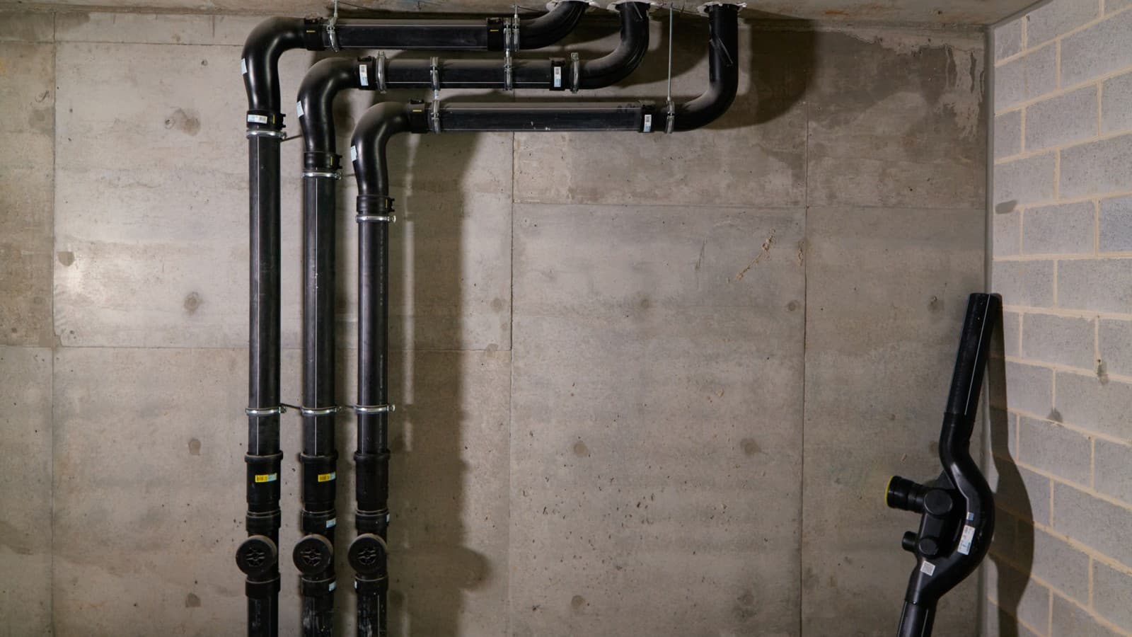 Bygningens avløp med SuperTube førte til en betydelig gevinst i boareal (© Michael Curwood & Adam Powell) Bygningens avløp med SuperTube førte til en betydelig gevinst i boareal (© Michael Curwood & Adam Powell)