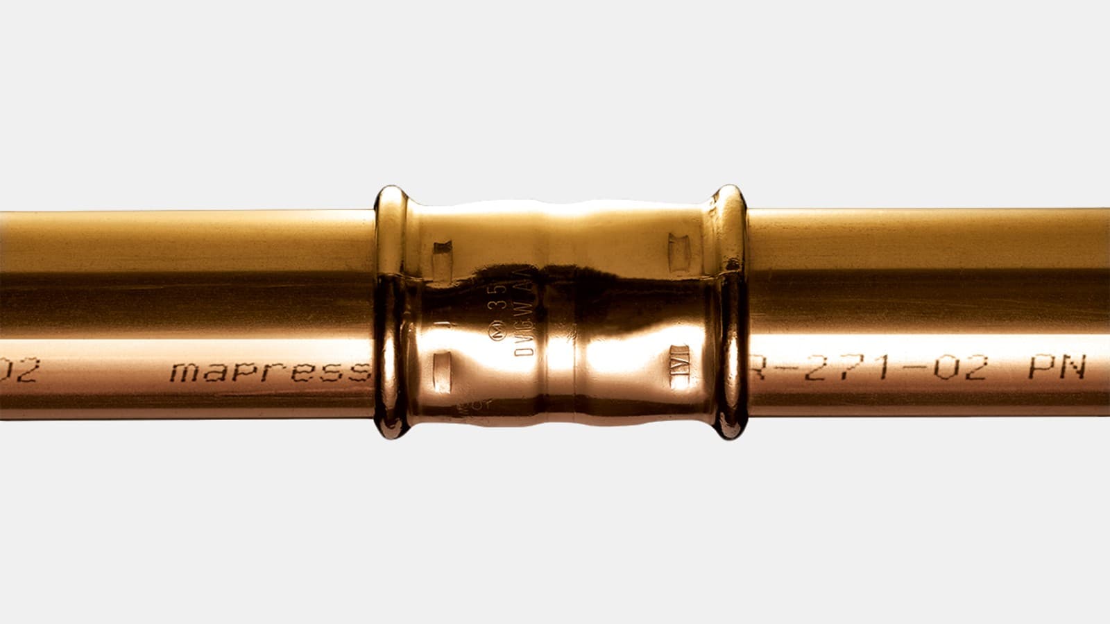 Geberit Mapress CuNiFe systemrør presset med en Geberit Mapress CuNiFe muffe Geberit Mapress CuNiFe systemrør presset med en Geberit Mapress CuNiFe muffe